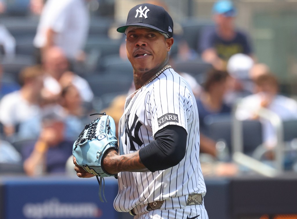 Marcus Stroman of the New York Yankees walking to the dugout.