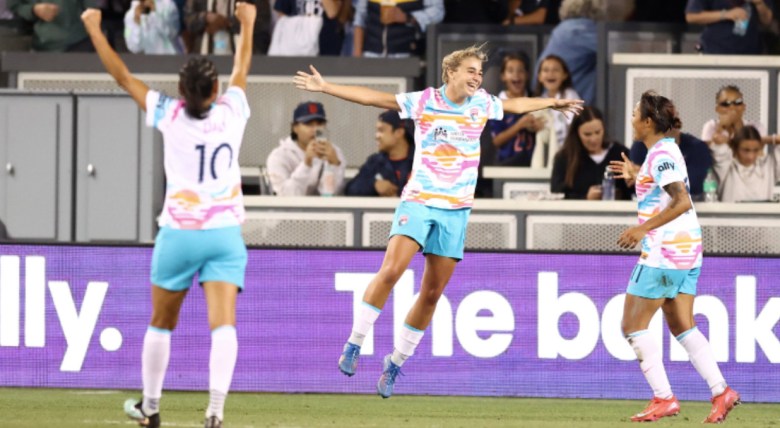 Three Wave players celebrate on Aug. 16, 2025.