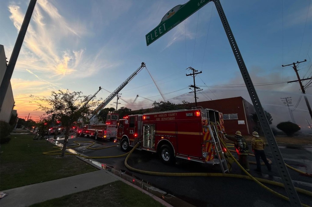 Firefighters battling a building fire.