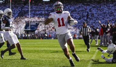 Ohio State Buckeyes wide receiver Brandon Inniss (11) makes a touchdown catch during the first half of the NCAA football game against the Penn State Nittany Lions.
