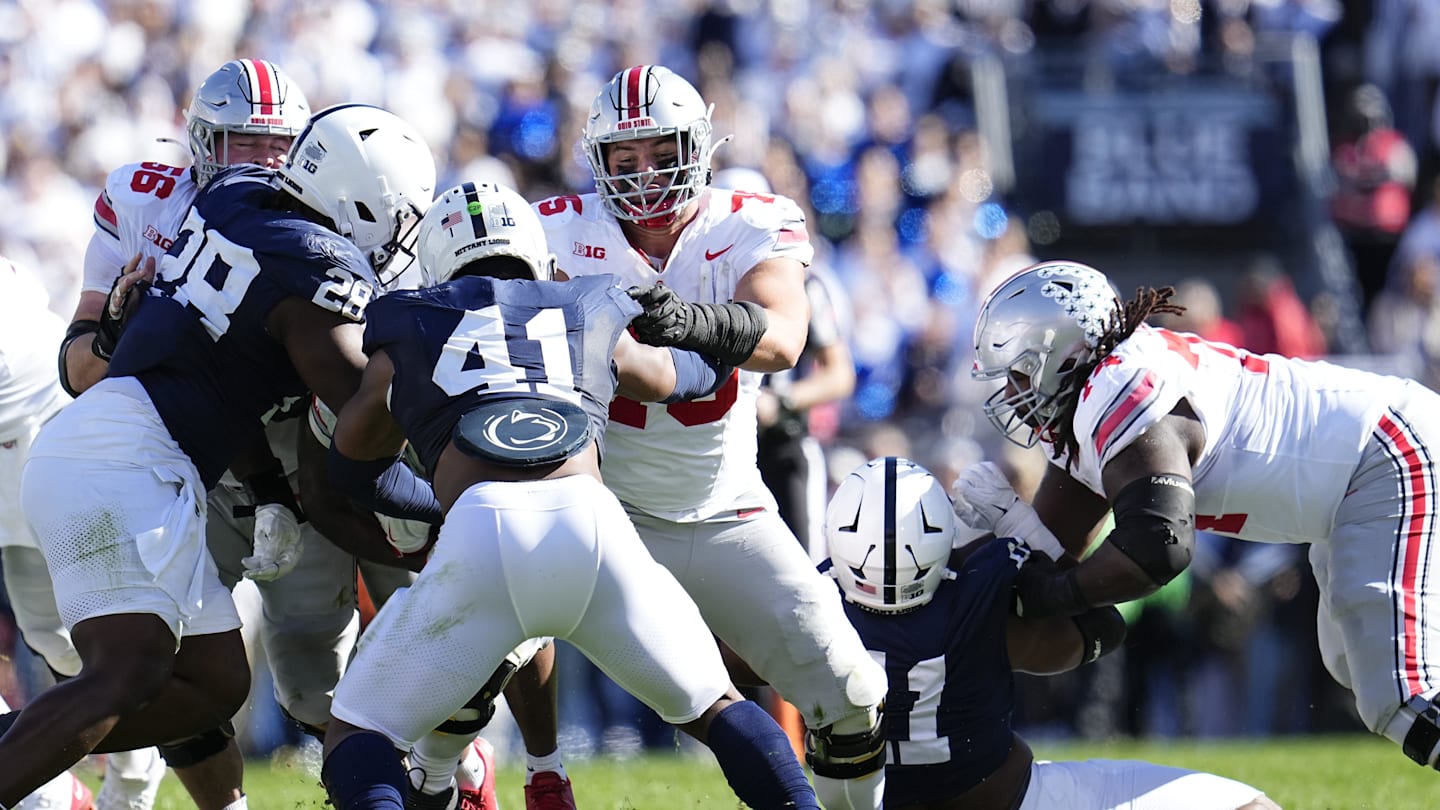 Ohio State Buckeyes offensive linemen Seth McLaughlin (56), Carson Hinzman (75) and Donovan Jackson (74) block during the NCAA football game against the Penn State Nittany Lions at Beaver Stadium in University Park, Pa. on Monday, Nov. 4, 2024. Ohio State won 20-13.