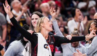 Indiana Fever guard Sophie Cunningham (8) and Indiana Fever guard Caitlin Clark (22) celebrate from the bench Saturday, Aug. 9, 2025, during a game between the Indiana Fever and the Chicago Sky at Gainbridge Fieldhouse in Indianapolis.