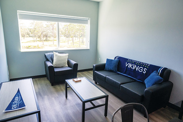 Pictured is the shared living area in one of the dormitory suites at the Palatka campus of St. Johns River State College. (PETER WILLOTT/Palatka Daily News)