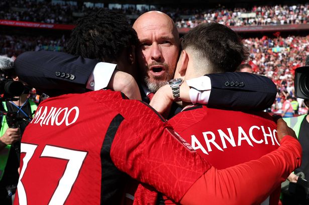 Erik ten Hag, Manager of Manchester United, celebrates with Kobbie Mainoo and Alejandro Garnacho of Manchester United after the team's victory in the Emirates FA Cup Final match between Manchester City and Manchester United