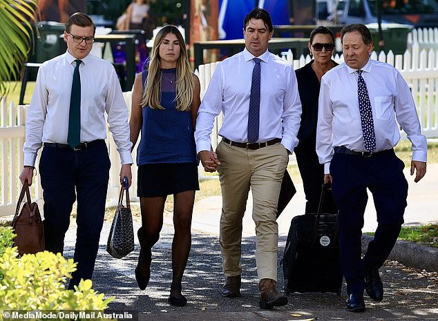 Wright arrives with his legal team