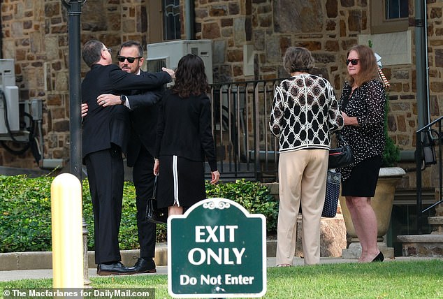 Devastated friends and family comforted each other outside of the Pennsylvania church