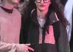 Julia Garner looked dramatically different from her usual self when she was spotted in Vancouver, Canada, on Wednesday; seen with costar Anthony Boyle