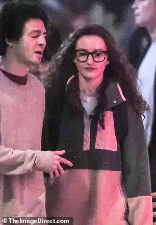 Julia Garner looked dramatically different from her usual self when she was spotted in Vancouver, Canada, on Wednesday; seen with costar Anthony Boyle