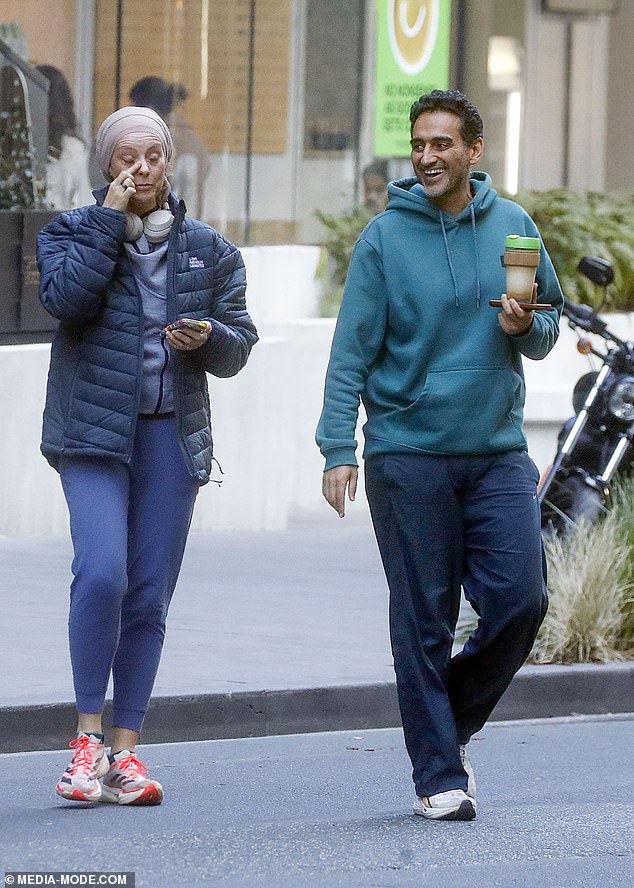 He added a pair of navy track pants and sneakers, and had let his facial hair grow out, with some stubble visible
