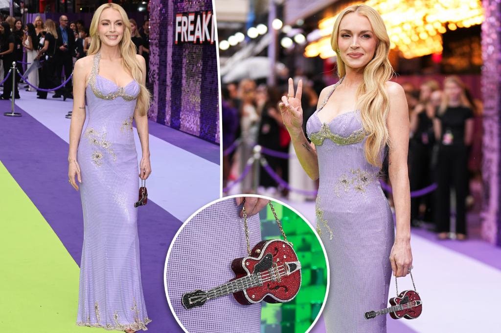 Lindsay Lohan rocks mini guitar purse on 'Freakier Friday' UK premiere red carpet