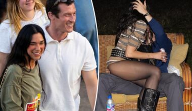 Dua Lipa and fiancé Callum Turner get hot and heavy to celebrate singer's Kosovo citizenship