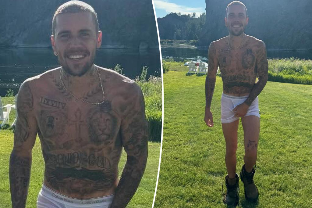 Justin Bieber has his hands full in nothing but tighty-whities and combat boots