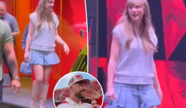 Taylor Swift pairs her new engagement ring with a pleated skirt at Nebraska vs. Cincinnati game