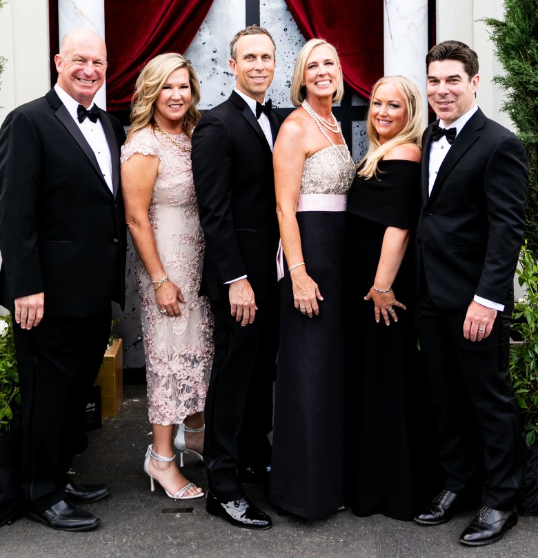 Co-chair Jenny McGowan and her husband Mike, Jewel Ball chair Katherine Kozo and her husband Chris, co-chair Karen Benito and her husband Ed. (Photo courtesy of Las Patronas)