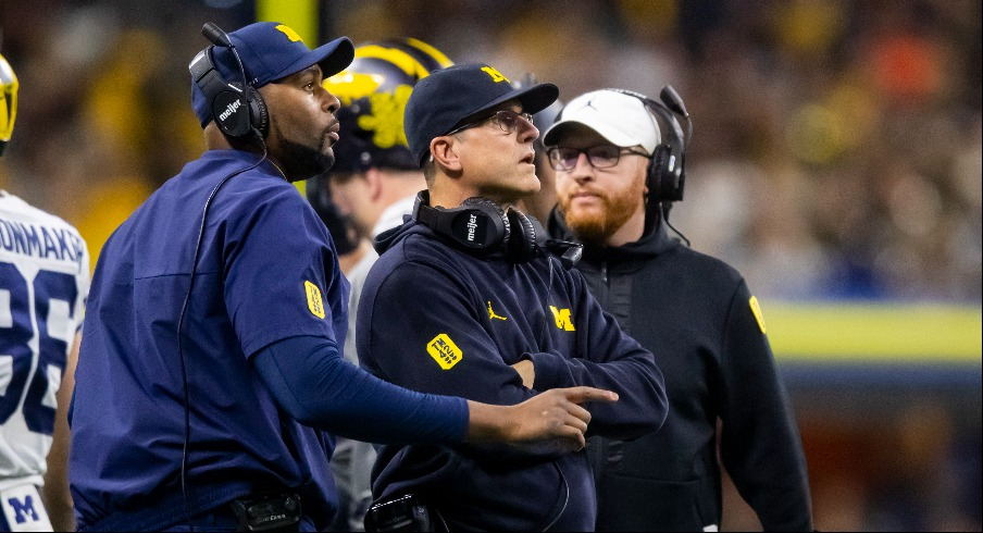Jim Harbaugh and Sherrone Moore