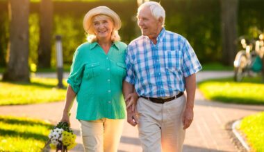 happy senior couple walking in park, retirement