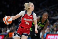 FILE - Washington Mystics guard Karlie Samuelson (44) moves the ball against Seattle Storm...