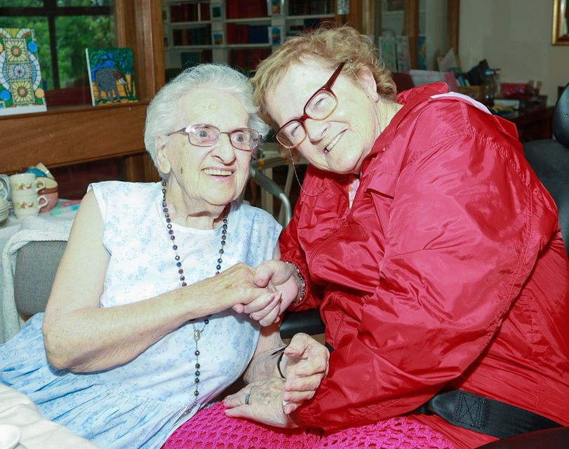 Carmel Carroll with her friend Ann Cushe celebrating turning 102 with family, friends and staff in Valentia Nursing Home Camolin. PHOTO: Sabrina Ffrench