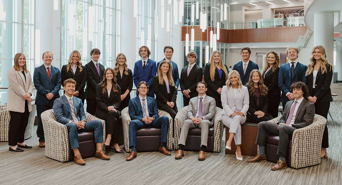 Rader and Smith are both part of the K-State Sales Team. Rader- back row, third from the left; Smith- back row, fifth from the left. Courtesy of Kansas State University