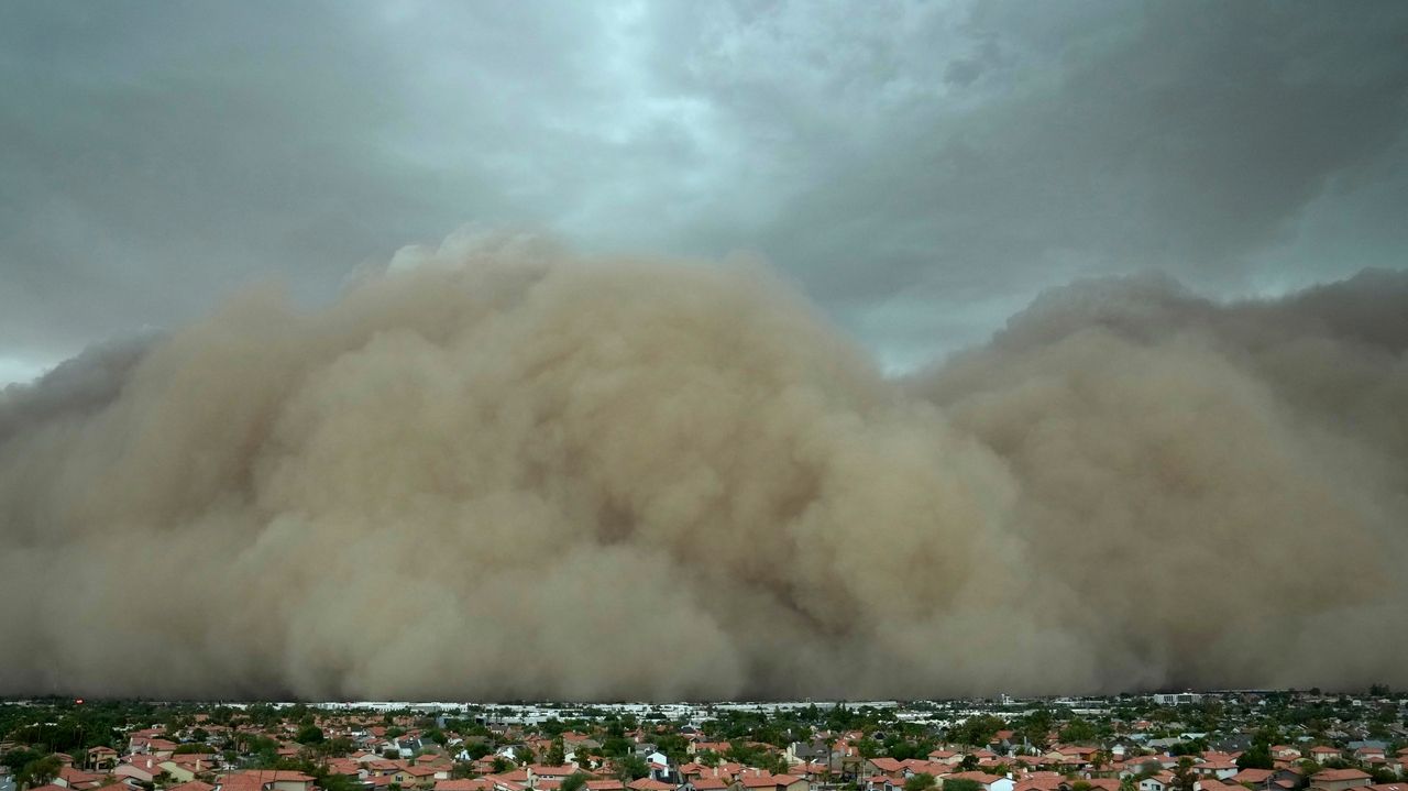 Towering wall of dust rolls through metro Phoenix, leaving tens of thousands without power