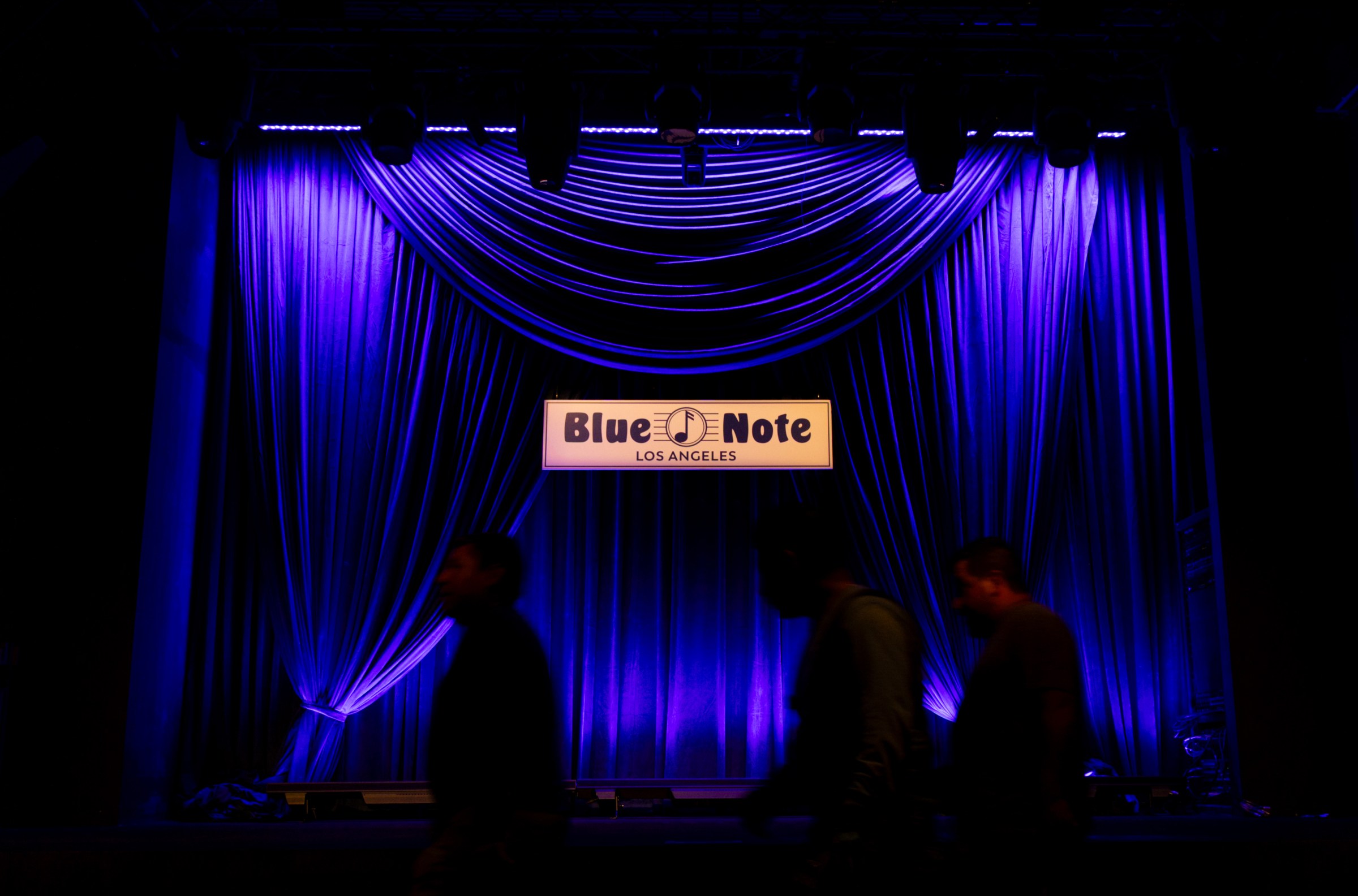Stage at Blue Note Jazz Club Los Angeles lit in purple and blue