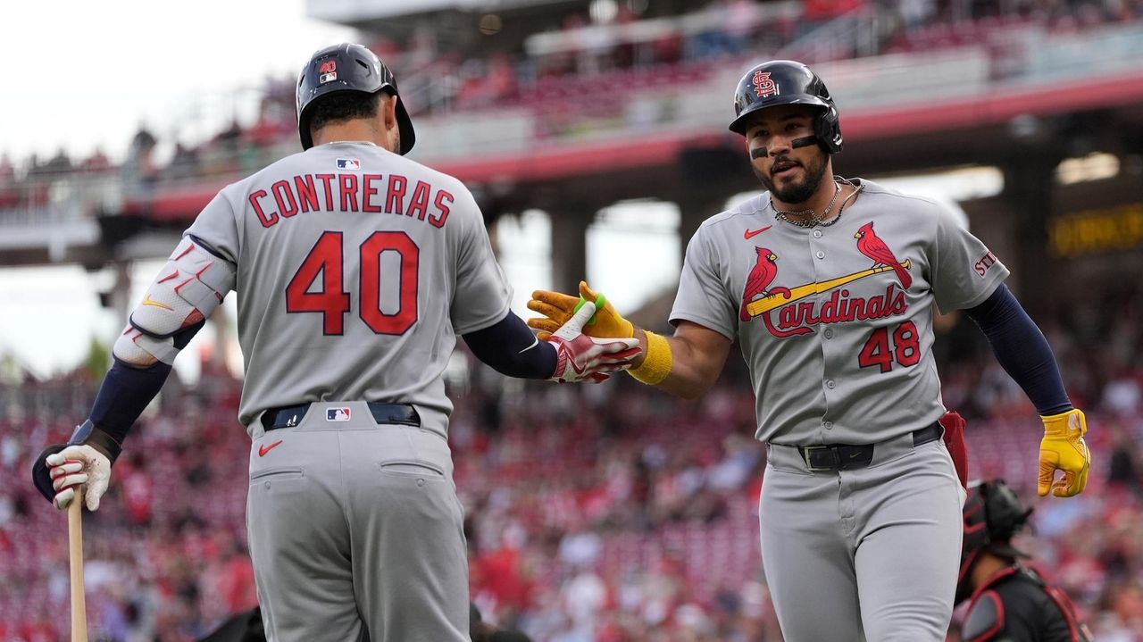 Winn drives in 3 runs, Cardinals take advantage of De La Cruz's error in 10th for 7-5 win over Reds