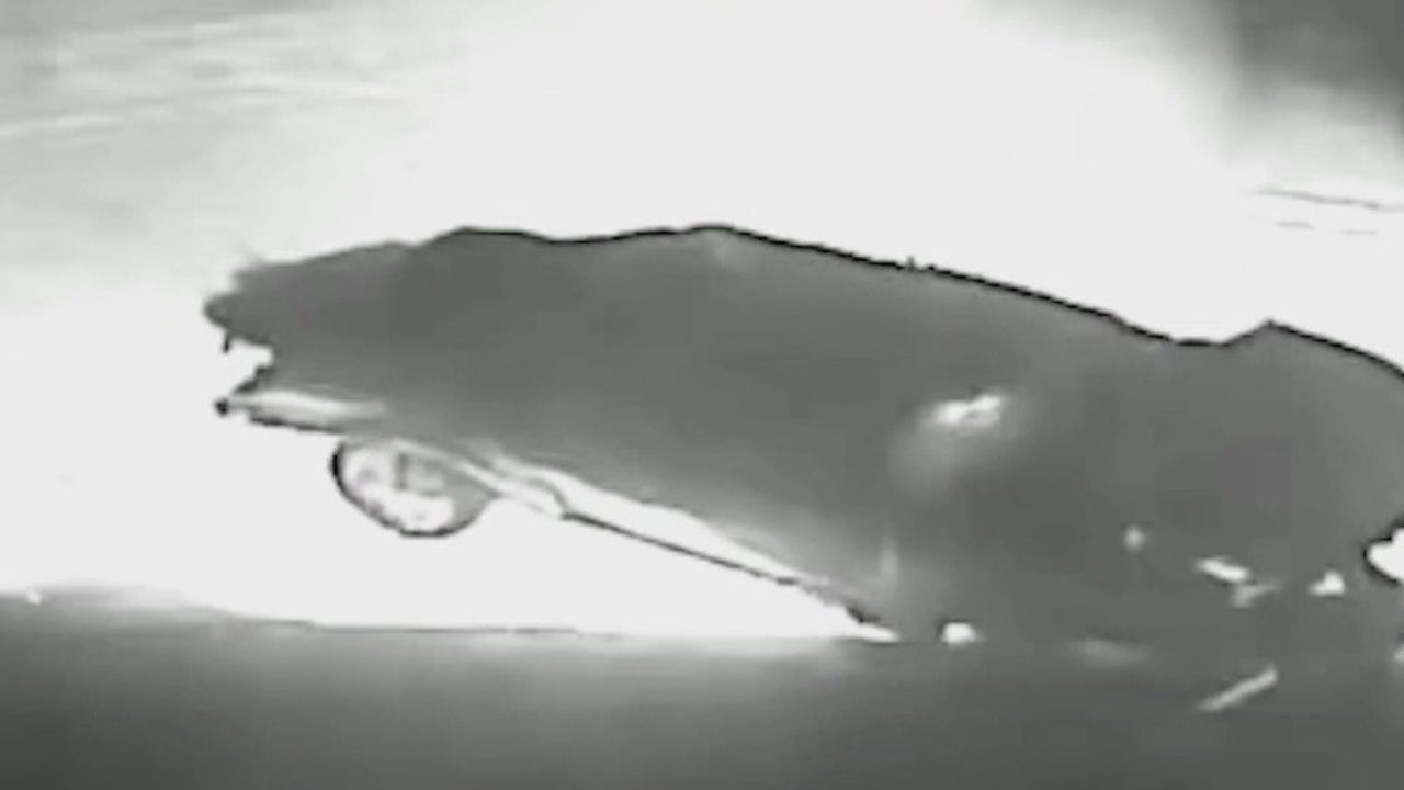 Car flips over, catches fire in Phoenix pawn shop parking lot