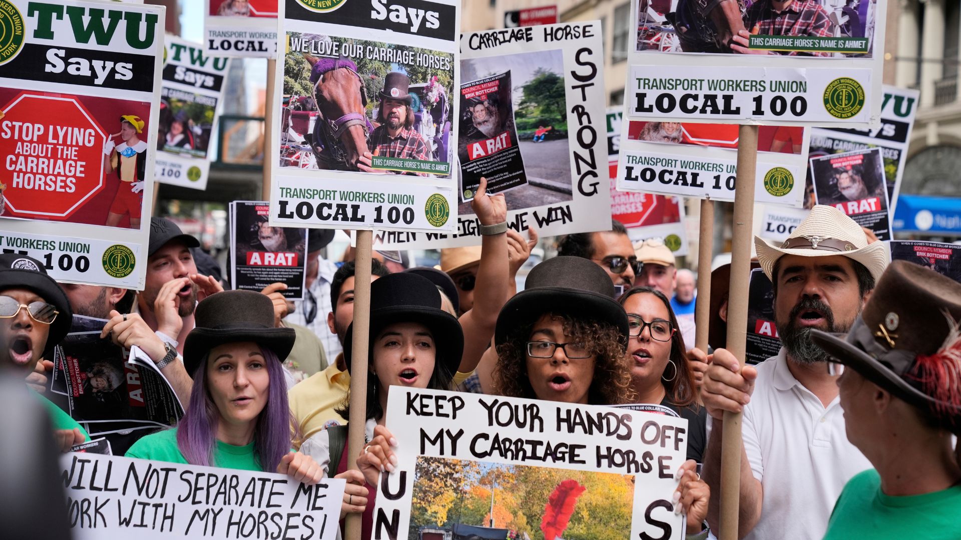 Horse carriage drivers and their supporters rally in New York, Tuesday, Aug. 19, 2025.
