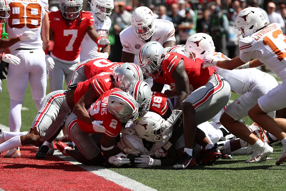 COLUMBUS, OH - AUGUST 30: Ohio State Buckeyes safety Caleb Downs (2), safety Jaylen McClain (18) cornerback Davison Igbinosun (1) and linebacker Sonny Styles (0) stop Texas from scoring during the game against the Texas Longhorns and the Ohio State Buckeyes on August 30, 2025, at Ohio Stadium in Columbus, OH. (Photo by Ian Johnson/Icon Sportswire via Getty Images)