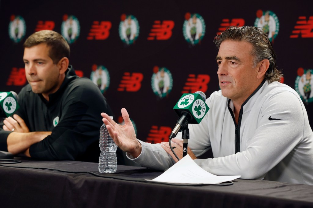 Brad Stevens and Wyc Grousbeck at a press conference.