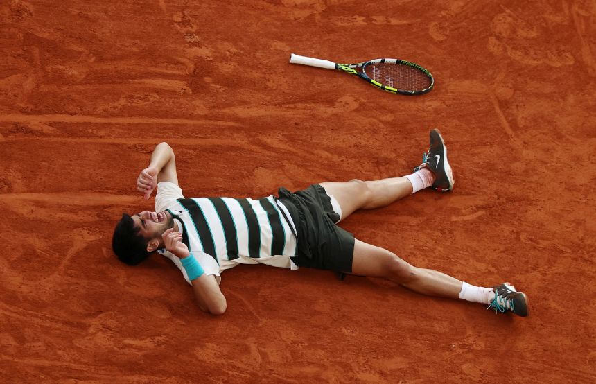 Alcaraz celebrates after defeating Sinner in a marathon French Open final in June.