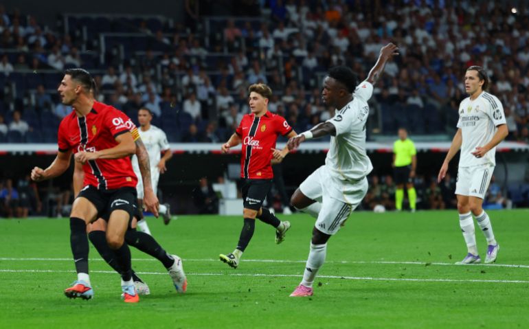 Real Madrid's Vinicius Junior scores their second goal against Mallorca