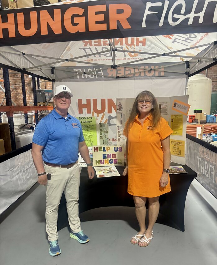 Dean and Sherri Porter, founders of Hunger Fight, at their open house.