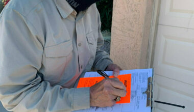Then-Arrowhead Constable Michael Branham fills out a Writ of Restitution as part of the eviction process. Most eviction filings in the Valley come from north Phoenix, Tempe and the Glendale/Avondale areas.