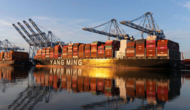 he sun rises over container ships docked at the Port of Tacoma's Husky Terminal in Tacoma, Washington