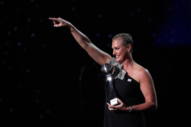 Katie Schumacher-Cawley accepts the Jimmy V Award for Perseverance at the ESPY Awards in Los Angeles, July 16, 2025. (Mark J. Terrill/AP)