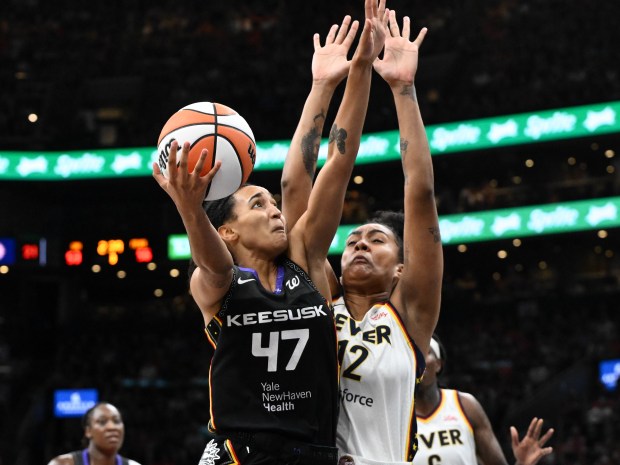 BOSTON, MASSACHUSETTS - JULY 15: Leila Lacan #47 of the Connecticut Sun drives to the basket against Damiris Dantas #12 of the Indiana Fever during the second half at the TD Garden on July 15, 2025 in Boston, Massachusetts. NOTE TO USER: User expressly acknowledges and agrees that, by downloading and/or using this Photograph, user is consenting to the terms and conditions of the Getty Images License Agreement. (Photo by Brian Fluharty/Getty Images)