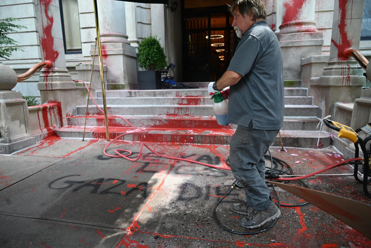 Red paint and graffiti outside the residence of New York Times Executive Editor Joe Kahn