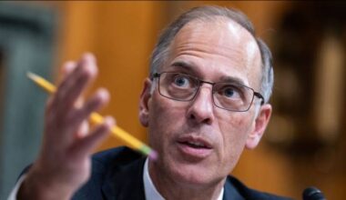 Economist Mark Zandi says US is on 'precipice of recession.' How to weather the fallout if — or when — it hits