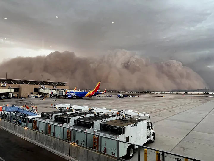 This photo provided by the City of Phoenix shows a towering cloud of dust at Phoenix Sky Harbor International Airport on Monday, Aug. 25, 2025.  