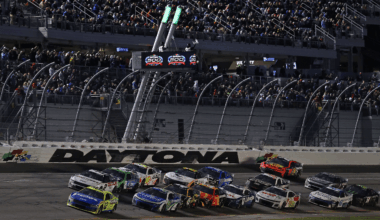 NASCAR Cup Series driver Michael Waltrip (15) walks through the garage area during practice for the Daytona 500 at Daytona International Speedway.