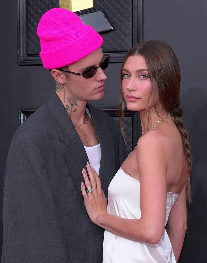 Justin and Hailey Bieber on a red carpet