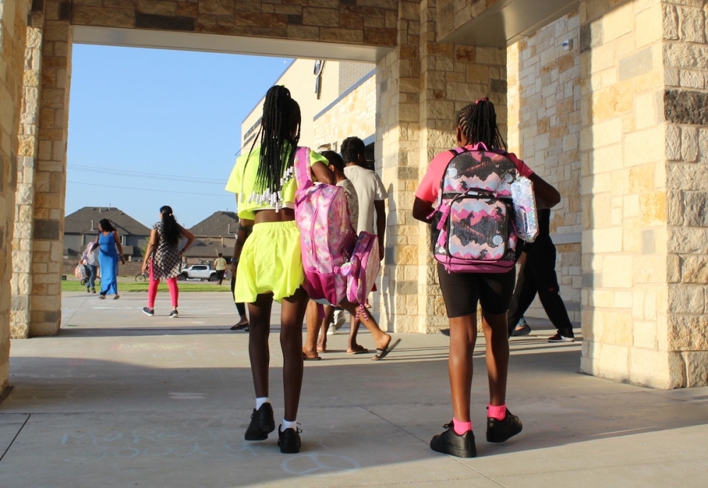 A photo of students walking to school