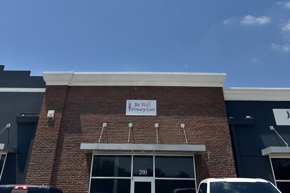 The storefront of Be Well Primary Care.