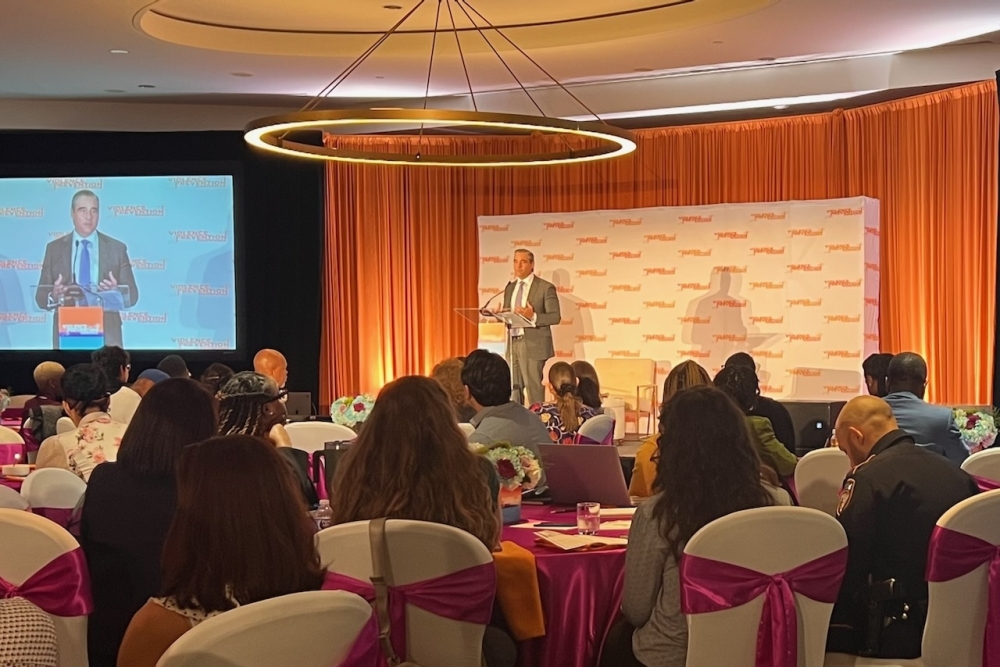 A photo of Harris County District Attorney speaking at the 2025 Violence Prevention Conference.