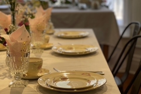 Salt & Light Collective dining room table with plates