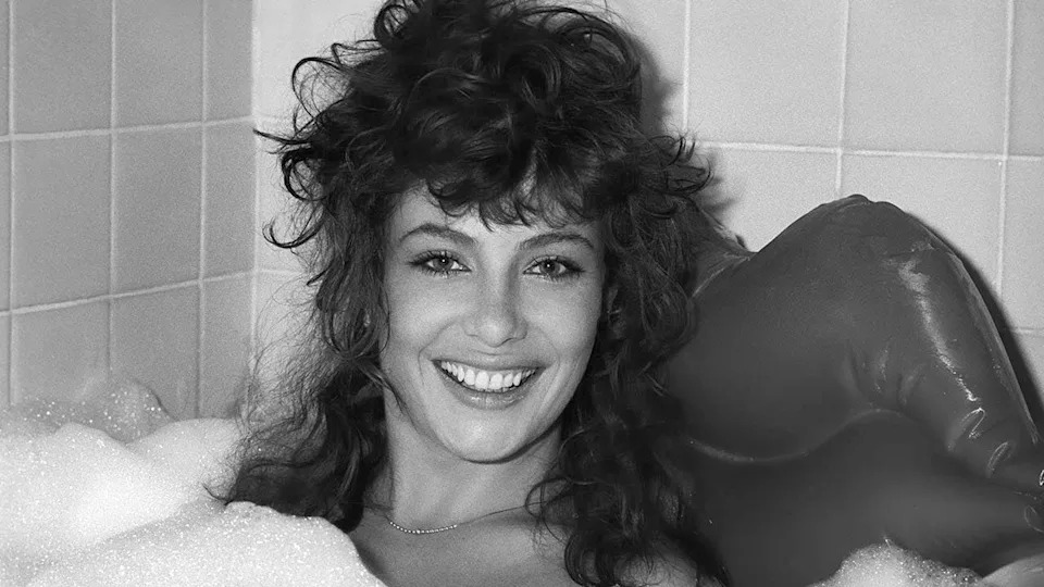kelly lebrock posing in a bathtub in 1982
