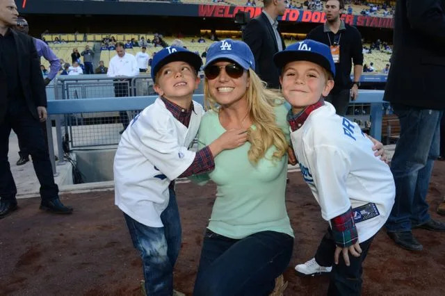 Getty Images Britney Spears with her sons at a baseball game in 2013.