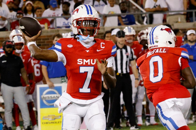 SMU quarterback Kevin Jennings (7) passes during the first half of an NCAA college football...