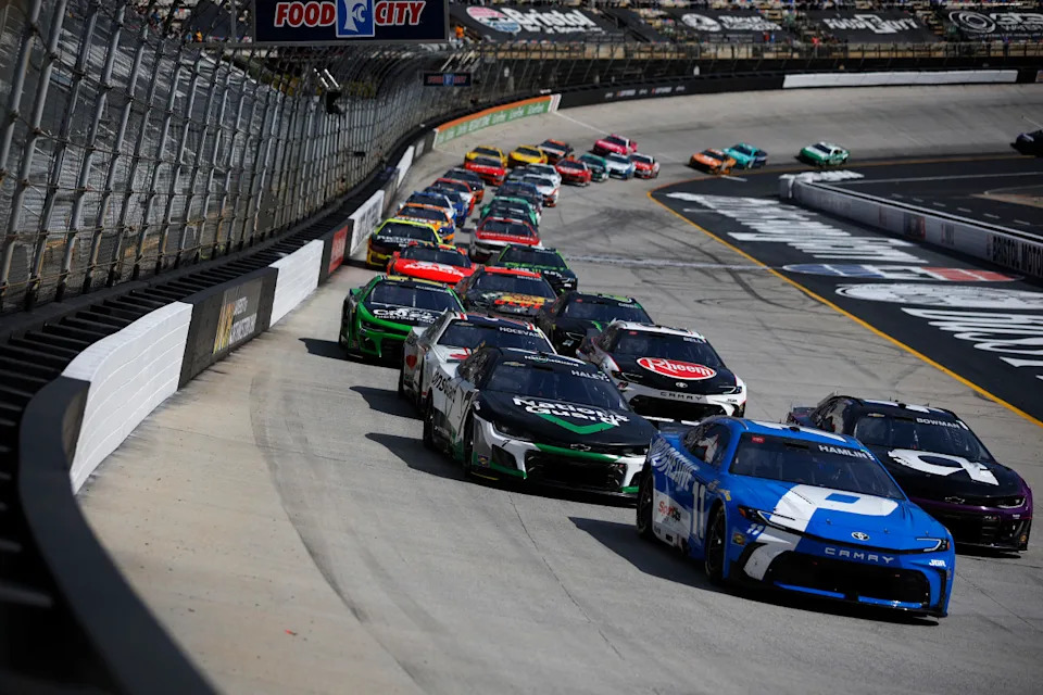 BRISTOL, TENNESSEE - APRIL 13: Denny Hamlin, driver of the #11 Progressive Toyota, leads during the NASCAR Cup Series Food City 500 at Bristol Motor Speedway on April 13, 2025 in Bristol, Tennessee. (Photo by Sean Gardner/Getty Images)Sean Gardner&sol;Getty Images